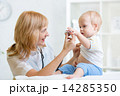 doctor woman examining child boy with stethoscope 14285350