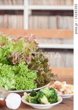 Fresh hydroponic vegetables on wooden table 14285365