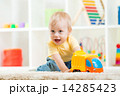 child boy toddler playing with toy car 14285423