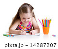 Happy little girl drawing with felt-tip pen in preschool 14287207