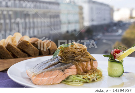 Baked salmon fillet with vegetables in a restaurant Baked salmon fillet with vegetables in a restaurant 14294957