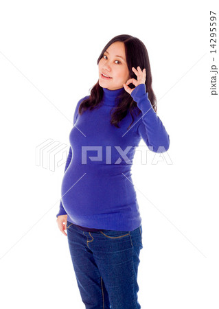 Pregnant asian woman isolated on white ok zero hand gesture Pregnant asian woman isolated on white ok zero hand gesture 14295597