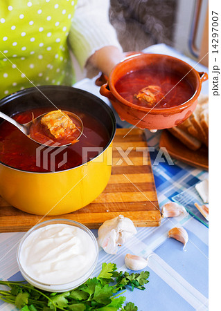Traditional Russian hot soup with meat, beetroot and cabbage Traditional Russian hot soup with meat, beetroot and cabbage 14297007