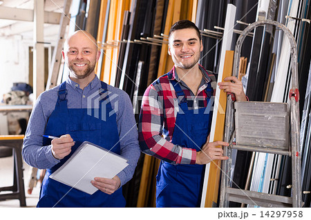 Two smiling workmen at factory Two smiling workmen at factory 14297958