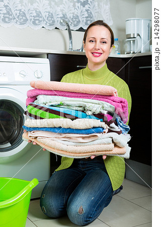 Brunette woman near washing machine 14298077