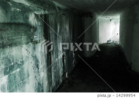 Empty abandoned bunker interior with glowing end 14299954