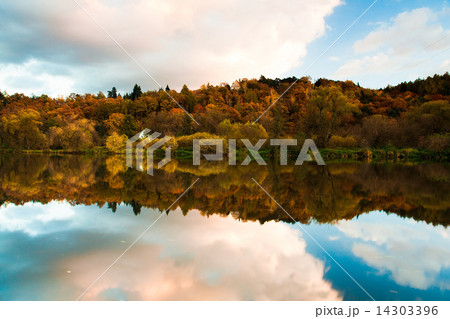 Reflection on the river in autumn at sunrise 14303396