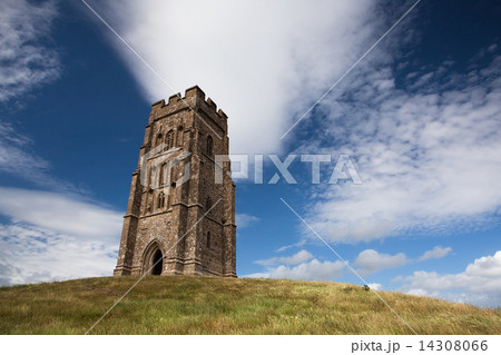 Tourists exploring the ruins of St. Michael's Tower at the top of glastonbury tor  14308066