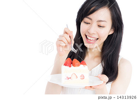 ケーキを食べる女性の写真素材