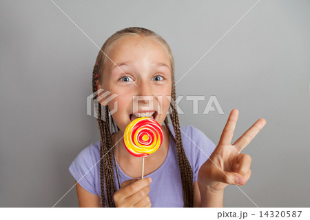happy girl with lollipop 14320587