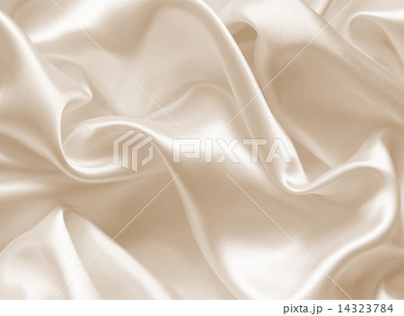 Smooth elegant golden silk as wedding background. In Sepia toned Smooth elegant golden silk as wedding background. In Sepia toned 14323784