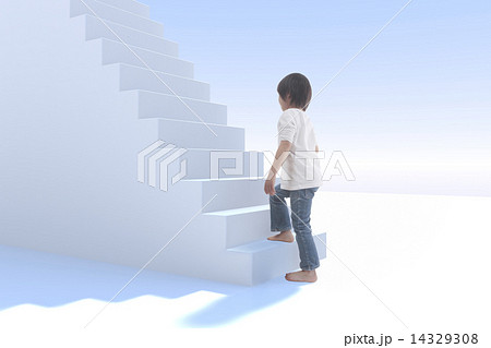 階段を上る子供の写真素材