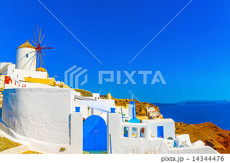 windmill in Oia of Santorini island in Greece 14344476