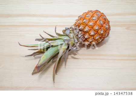fresh pineapple on the wooden table fresh pineapple on the wooden table 14347538