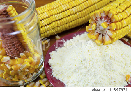 A jar with corn, flour and corn ear 14347971