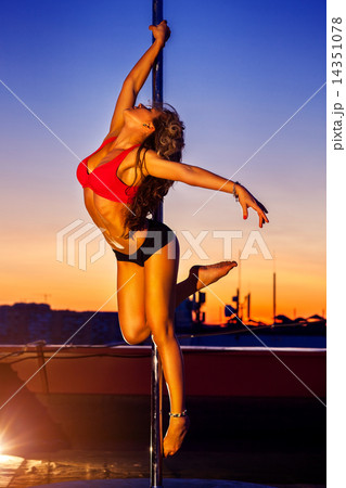 Young pole dance woman 14351078