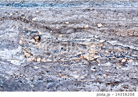 Layers of gray and brown soil 14356208