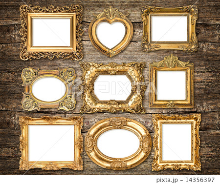 Baroque style golden frames over wooden background. Antique obje Baroque style golden frames over wooden background. Antique obje 14356397