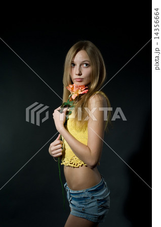 Pretty girl with flower 14356664