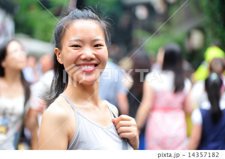 young asian woman on trip at jingli ancient street,chengdu,china young asian woman on trip at jingli ancient street,chengdu,china 14357182