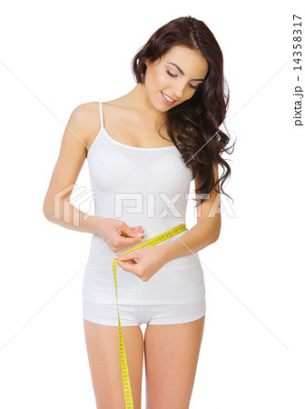 Young healthy girl with measurement tape 14358317