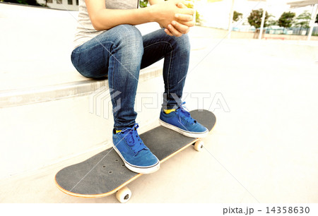 woman skateboarder at skatepark woman skateboarder at skatepark 14358630