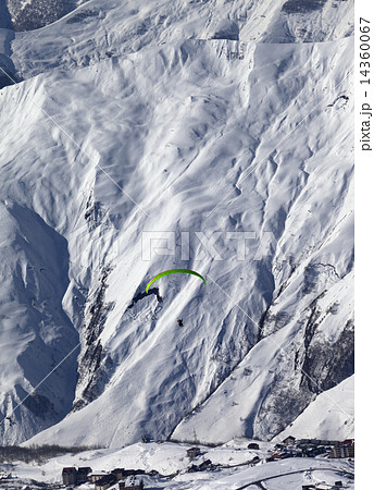 Speed flying in snow mountains in sun nice day Speed flying in snow mountains in sun nice day 14360067