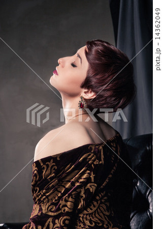 Portrait of young woman with short hair  14362049