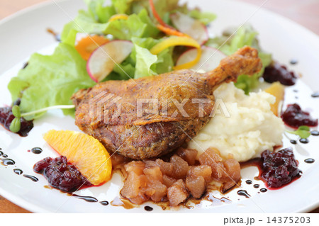 Duck confit , Roasted duck with blueberry sauce 14375203