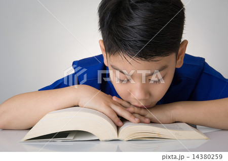 Little asian boy read a book Little asian boy read a book 14380259
