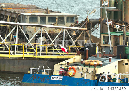 Ships moored at a shipyard 14385880