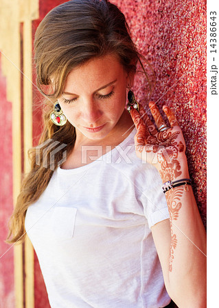 Mehendi on the hand of pretty girl 14386643