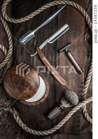 Shaving accessories on a luxury wooden background Shaving accessories on a luxury wooden background 14387256