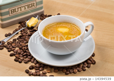 Coffee with milk and added butter Coffee with milk and added butter 14394539