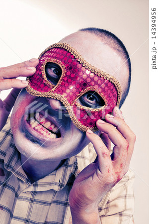 a zombie with a fancy mask a zombie with a fancy mask 14394956
