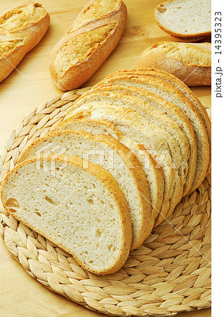 slices of pan de payes, a round bread typical of Catalonia, Spai slices of pan de payes, a round bread typical of Catalonia, Spai 14395323