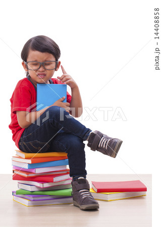 Cute boy holding books Cute boy holding books 14408858