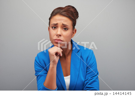 Young mixed race woman is sad Young mixed race woman is sad 14414145