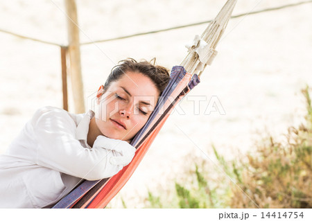 Woman sleeping on hammock Woman sleeping on hammock 14414754
