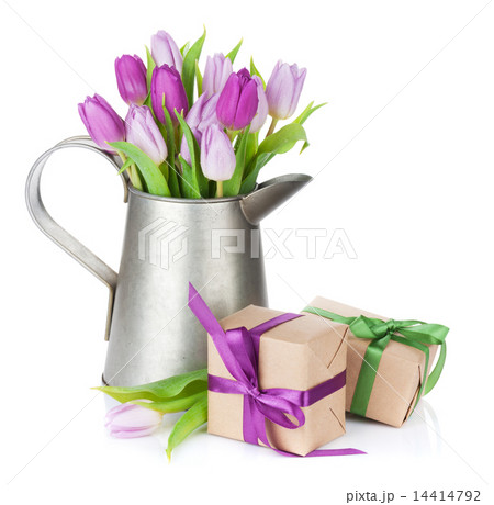 Purple tulip bouquet in watering can and gifts 14414792