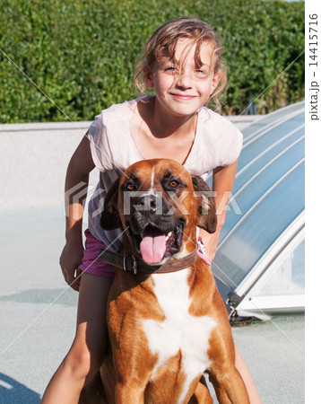 Young girl with dog 14415716