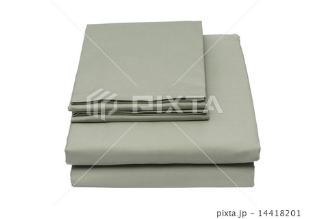 Folded bed linen or duvet cover on white isolated background 14418201