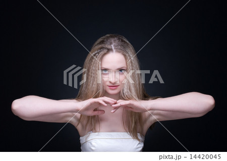 Close up portrait of beautiful blond girl on black Close up portrait of beautiful blond girl on black 14420045