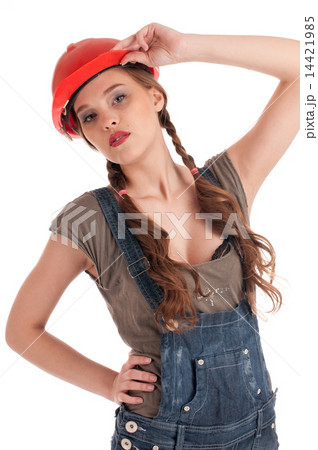 Young playful worker woman in coverall and helmet 14421985