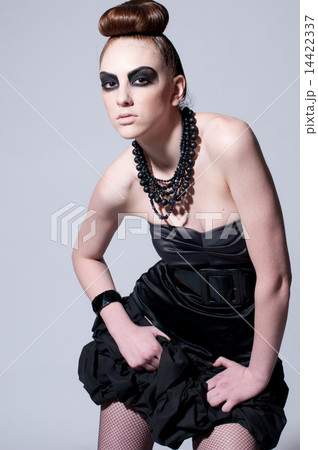 Beautiful fashion model with black make-up Beautiful fashion model with black make-up 14422337