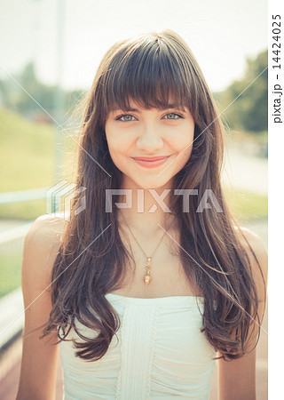 beautiful young woman with white dress 14424025