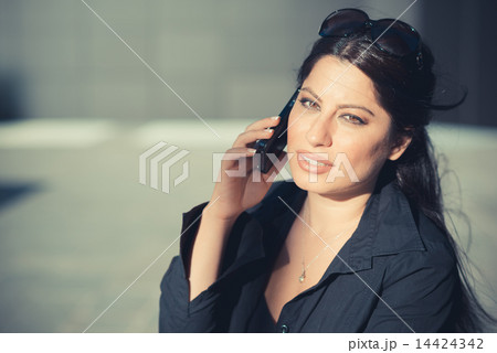 beautiful long black hair elegant business woman using smartphon beautiful long black hair elegant business woman using smartphon 14424342