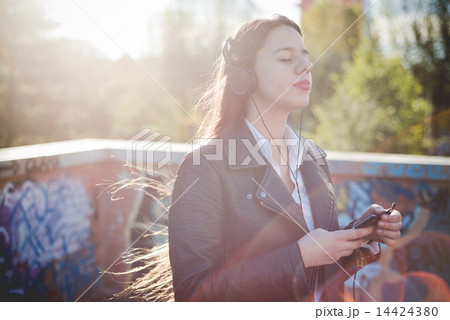 young beautiful long hair woman in town 14424380