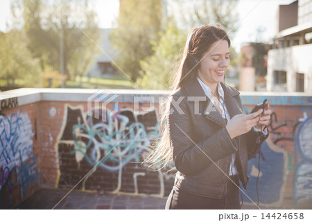 young beautiful long hair woman in town 14424658