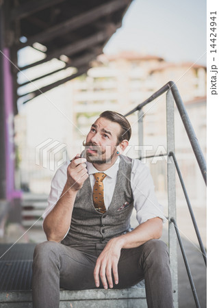 handsome big moustache hipster man smoking pipe 14424941